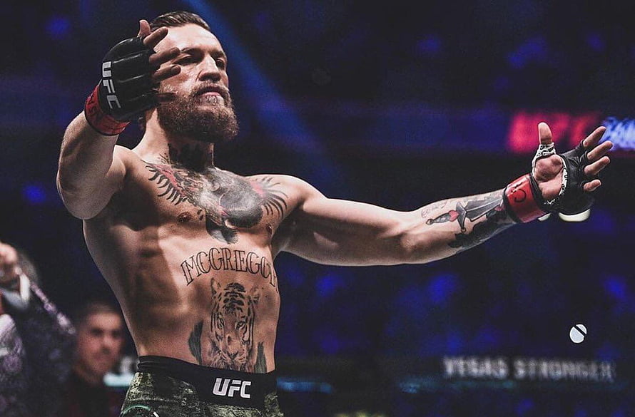 Conor McGregor UFC Fighter Celebrating Victory in the Octagon HD wallpaper