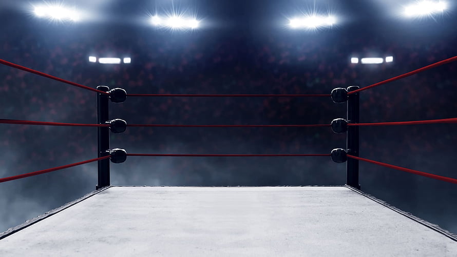 Empty Boxing Ring Under Bright Arena Spotlights With Red Ropes And Dark Crowd HD wallpaper
