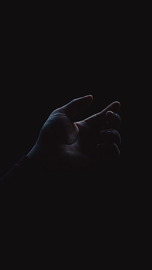 Mysterious Silhouetted Hand Reaching Into Deep Darkness HD phone wallpaper