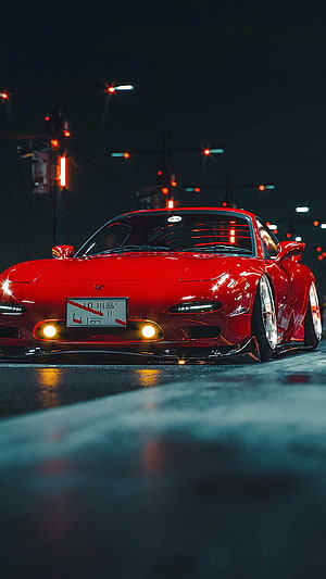 Red Mazda RX-7 JDM Street Car at Night with Neon City Lights and Wet Asphalt Reflections HD phone wallpaper