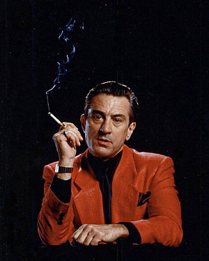 Robert De Niro in a red suit holding a cigarette against a dark background HD phone wallpaper