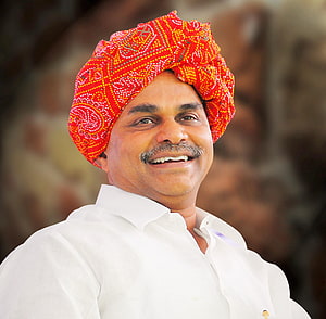 Portrait of a smiling man wearing a vibrant red patterned turban and white shirt, Dr YSR Live for Android, #ysr HD wallpaper