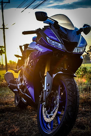 Purple Yamaha R15 Sport Motorcycle Parked in Grass at Sunset HD phone wallpaper