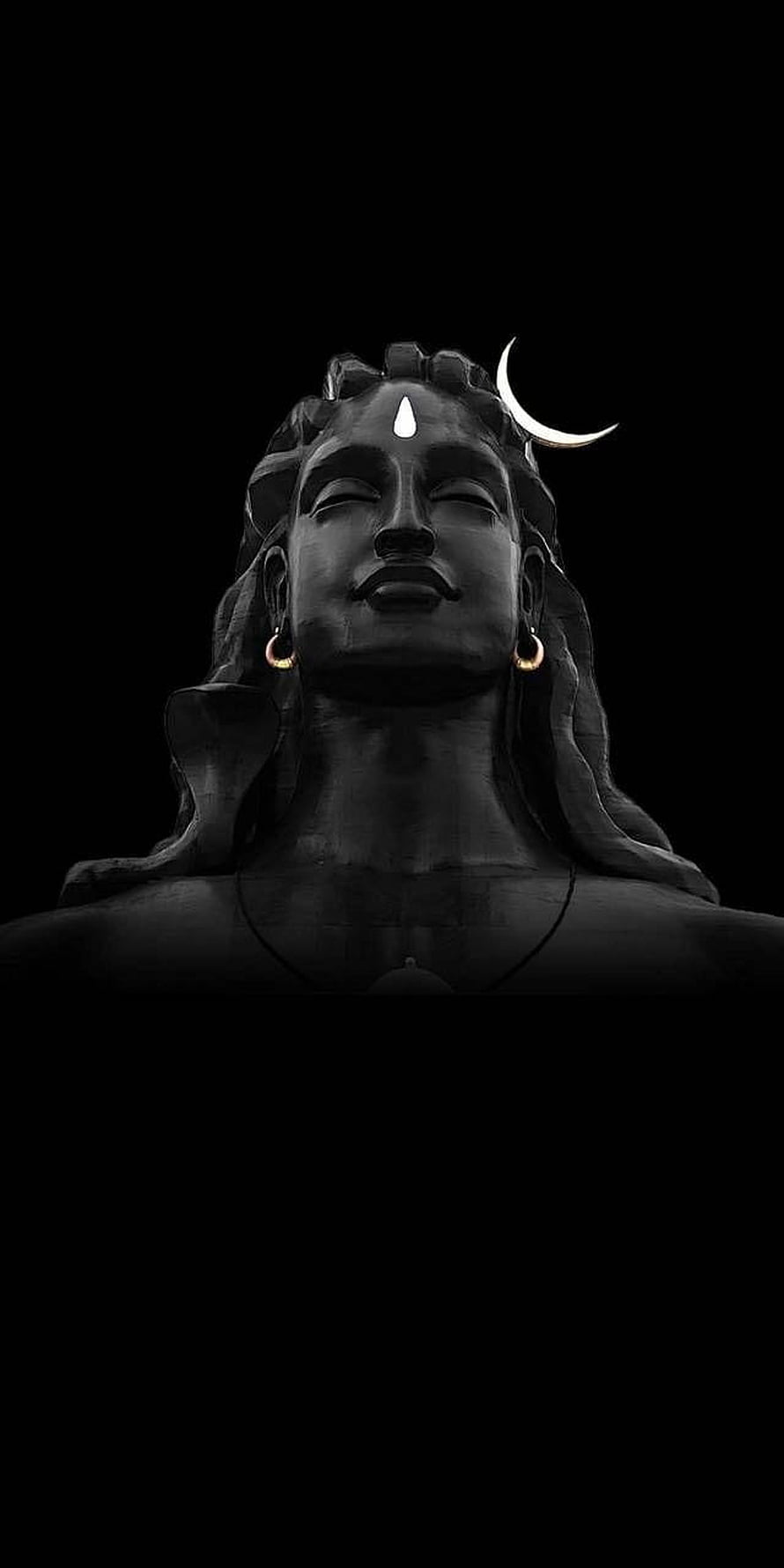Adhiyogi Statue with Crescent Moon and Third Eye on Black Background HD phone wallpaper