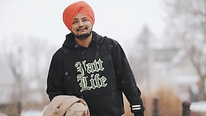 Man in Orange Turban and Black Hoodie Standing in Snowy Winter Landscape, Sidhu Moose Wala Jatt Life 39586, #jatt life HD wallpaper