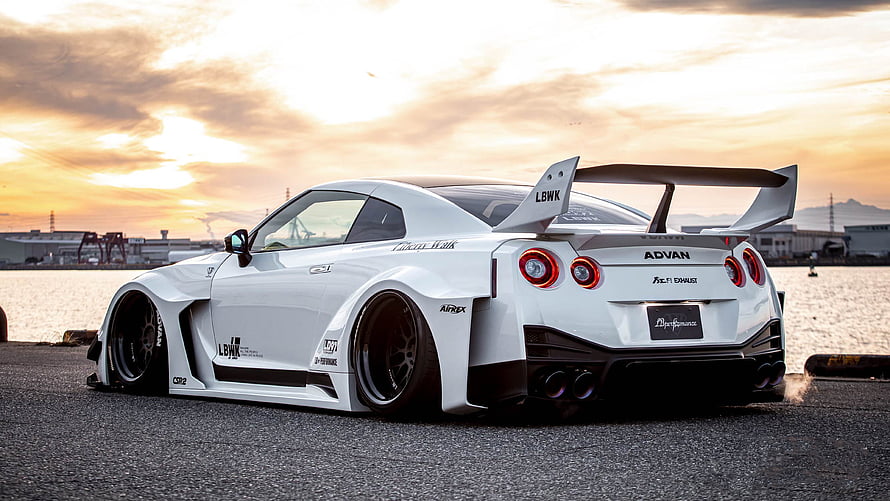 White Nissan GT-R LB-WORKS Widebody at Sunset Harbor HD wallpaper