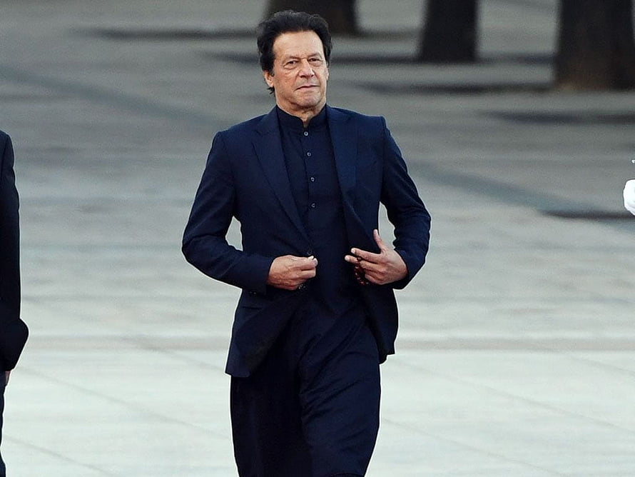 Imran Khan Walking in a Dark Blue Suit and Traditional Shirt HD wallpaper