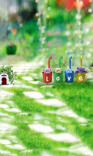 Cute Teddy Bears in Colorful Buckets Spelling Love in a Lush Garden Path HD phone wallpaper
