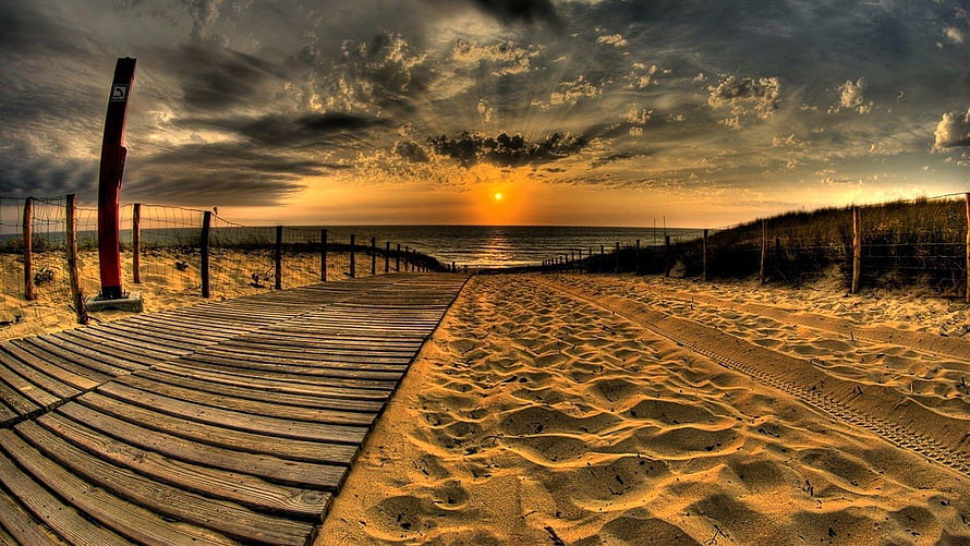 Dramatic Beach Sunset with Wooden Boardwalk and Sand Dunes HD wallpaper