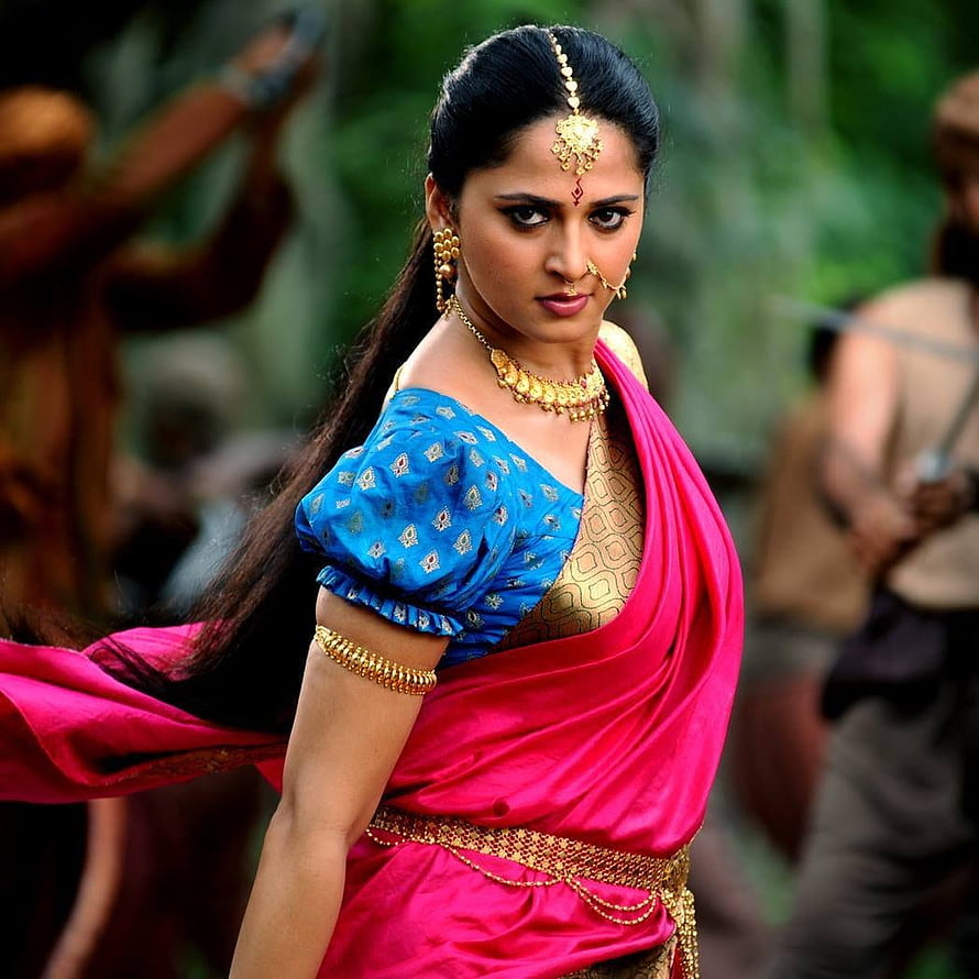 Anushka Shetty in Baahubali 2: The Conclusion wearing vibrant pink and blue traditional attire HD phone wallpaper
