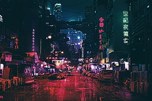 Neon-lit cyberpunk street scene with wet pavement reflecting pink and blue lights, featuring Chinese signage and futuristic cityscape HD wallpaper