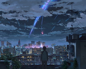 Anime Boy Watching Meteor Shower Over City Skyline at Night HD wallpaper