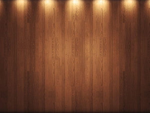 Warm Wooden Plank Wall Texture with Soft Overhead Spotlight Illumination HD wallpaper