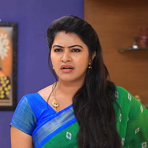 Rachitha Mahalakshmi in a vibrant green and blue saree with gold jewelry HD phone wallpaper