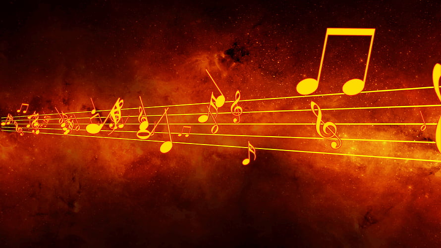 Glowing golden musical notes and staff lines flowing across a fiery orange nebula background HD wallpaper