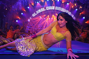 Kareena Kapoor performing a dramatic dance pose on stage at the Global Cine Awards HD wallpaper