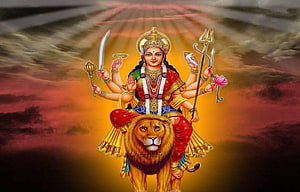 Goddess Durga Riding Lion With Weapons And Trishul Against Sunset Sky HD wallpaper