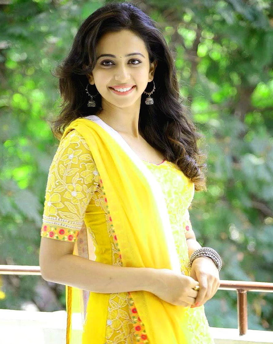 Rashmika Mandanna in a vibrant yellow traditional salwar kameez with intricate embroidery and floral details, : Hero Heroine Ke, south hero and heroine HD phone wallpaper