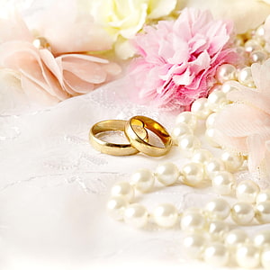 Elegant Gold Wedding Bands with Pearls and Soft Pink Flowers on Lace HD phone wallpaper
