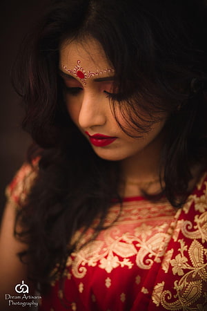Elegant Indian Bride in Red Saree with Traditional Mehndi and Bridal Makeup HD phone wallpaper