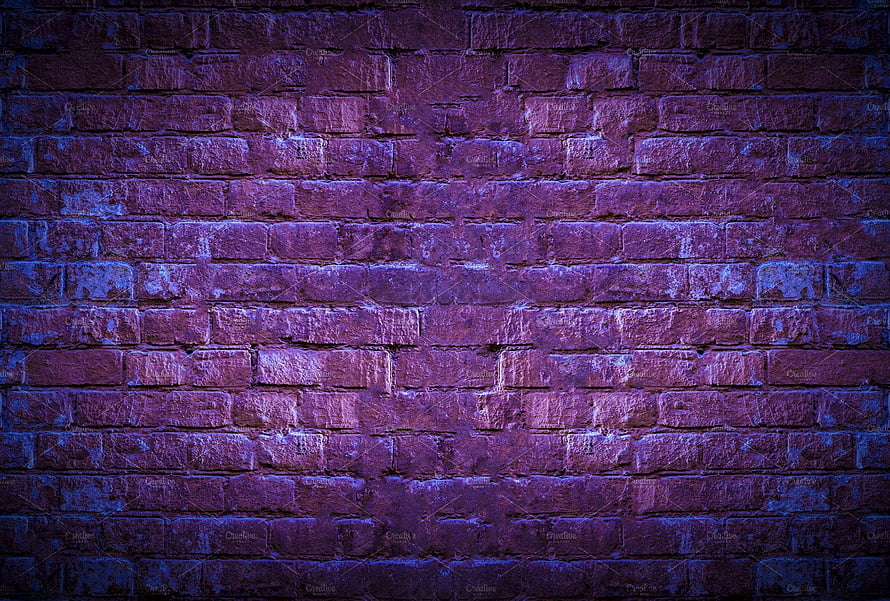 Neon-lit brick wall texture with purple and blue glow for urban background HD wallpaper