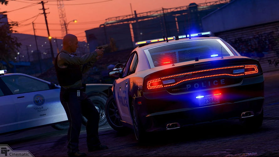 Police officer aiming handgun next to patrol car with flashing lights at sunset HD wallpaper