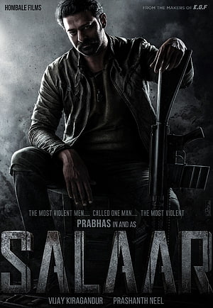 Prabhas as Salaar holding a rifle in a dark cinematic movie poster HD phone wallpaper