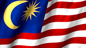 Malaysia National Flag Waving in Wind with Crescent Moon and Star HD wallpaper