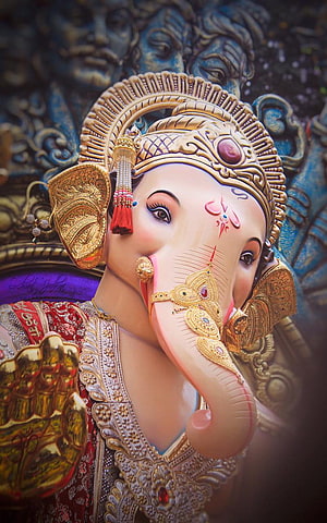 Ornate Ganesha Statue With Golden Crown And Intricate Jewelry HD phone wallpaper