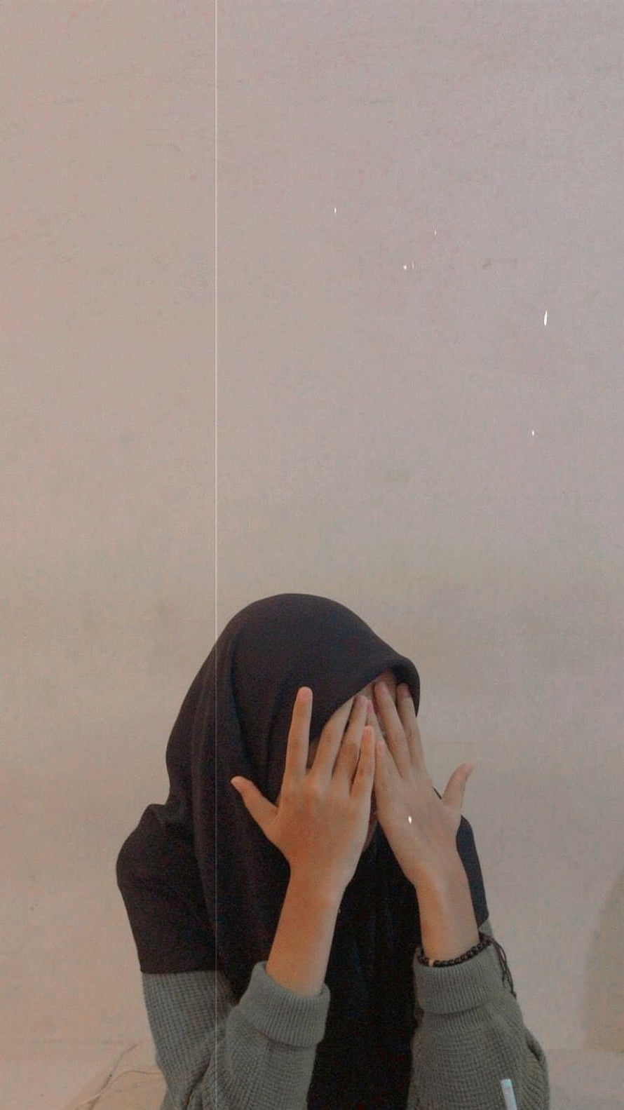 Hijabi Girl Covering Face With Hands in Minimalist Portrait HD phone wallpaper
