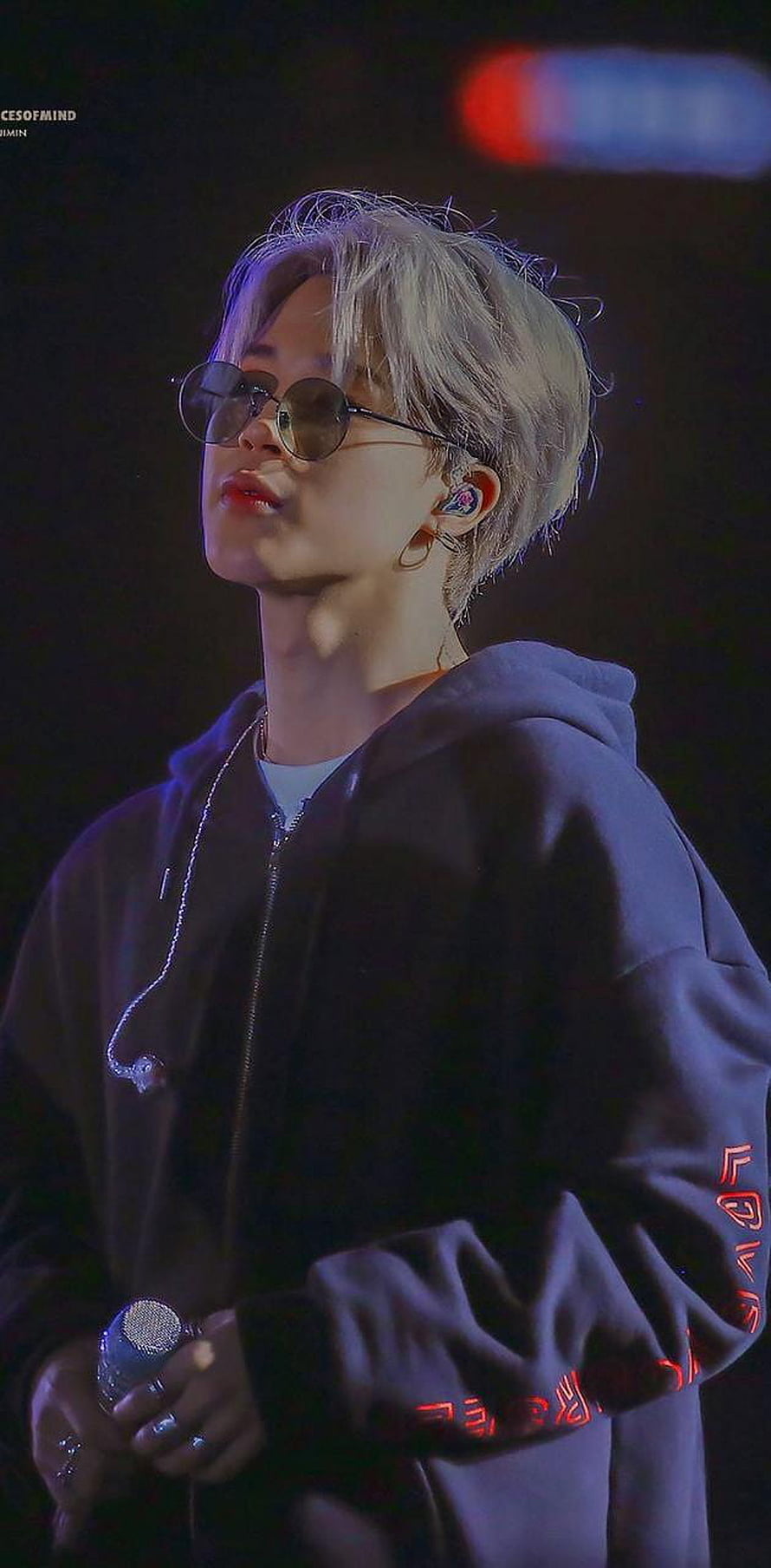Jimin from BTS performing on stage in a dark hoodie and round sunglasses HD phone wallpaper