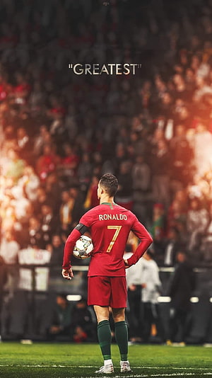 Cristiano Ronaldo in Portugal Red Jersey Standing on Soccer Field with Ball HD phone wallpaper
