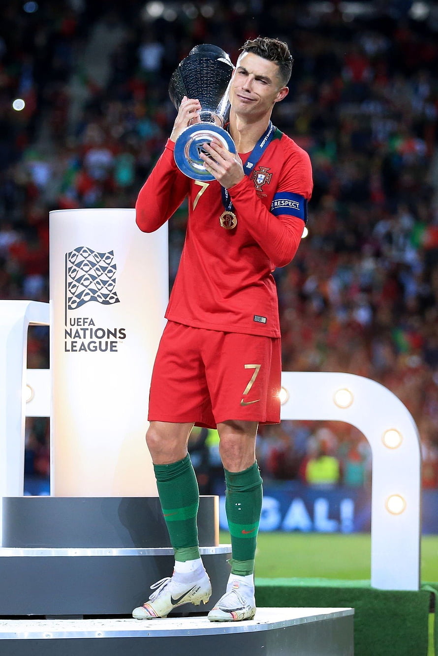 Cristiano Ronaldo Kissing UEFA Nations League Trophy in Portugal Kit HD phone wallpaper
