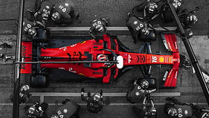 Ferrari F1 Car Pit Stop Overhead View With Crew HD wallpaper