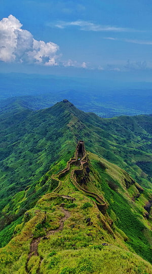 Torna Fort Ridge Trail in Maharashtra India with Lush Green Hills and Blue Sky HD phone wallpaper