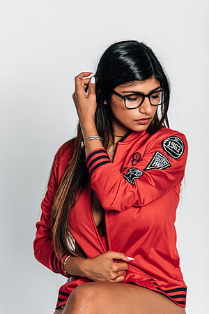 Woman in Red New York Knicks Jacket with Glasses and Long Dark Hair, Exclusive: Mia Khalifa Talks Twitch, John Wall All, #mia khalifa HD phone wallpaper