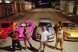 Fast and Furious Cast with Modified Supra, Skyline, RX-7, and Miata in Night Street Scene HD wallpaper