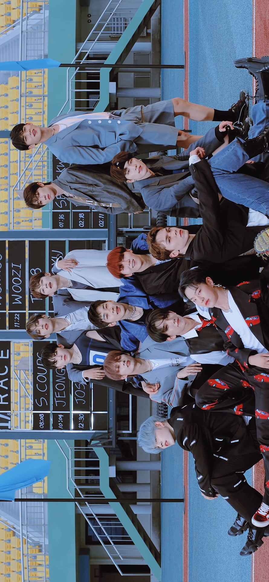 SEVENTEEN Group Photo at Stadium Track with Scoreboard HD phone wallpaper