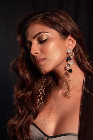 Malavika Mohanan Portrait With Geometric Crystal Earrings And Gold Eye Makeup HD phone wallpaper