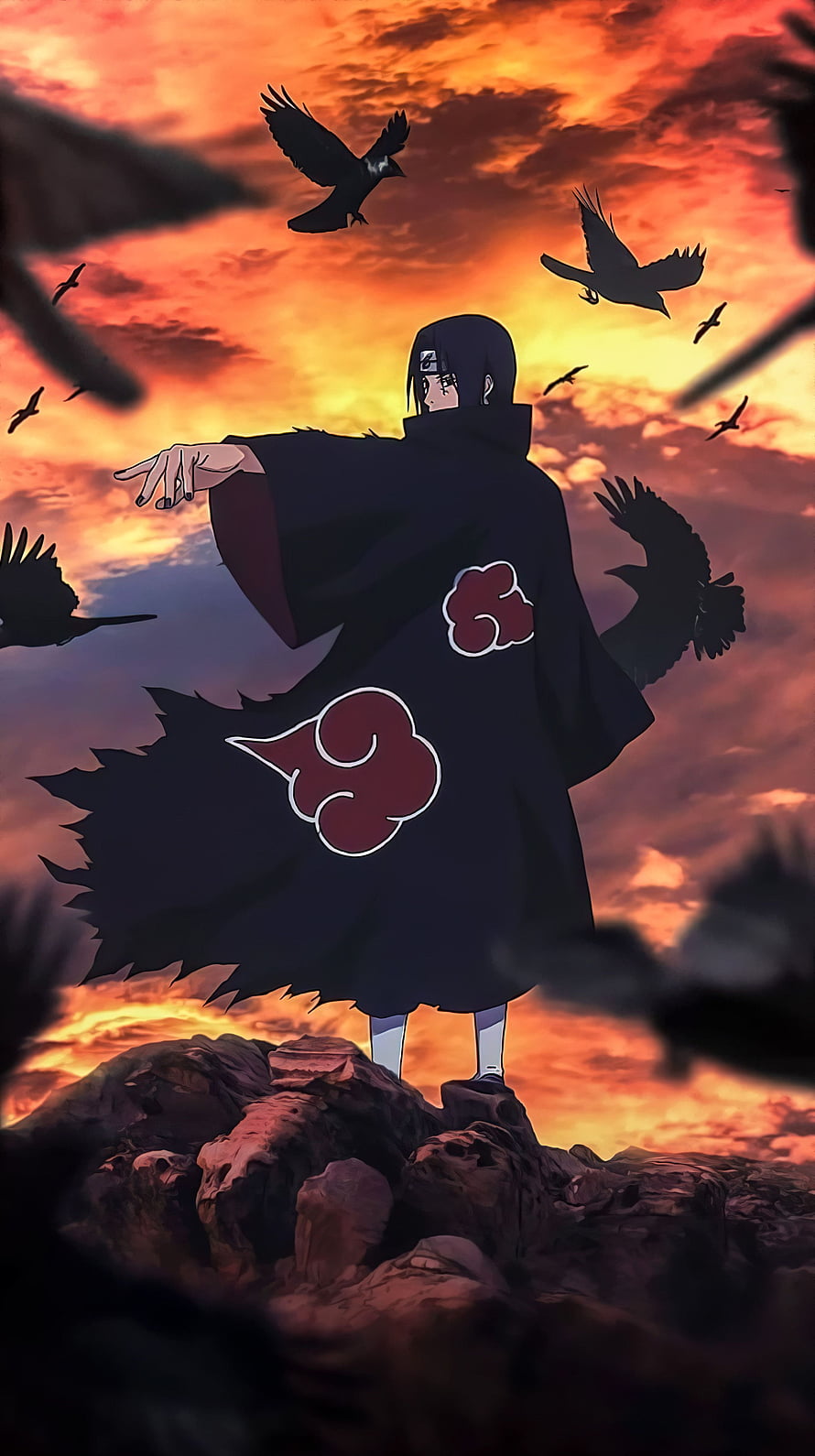 Itachi Uchiha in Akatsuki Cloak Standing on Rocky Outcrop with Crows at Sunset HD phone wallpaper