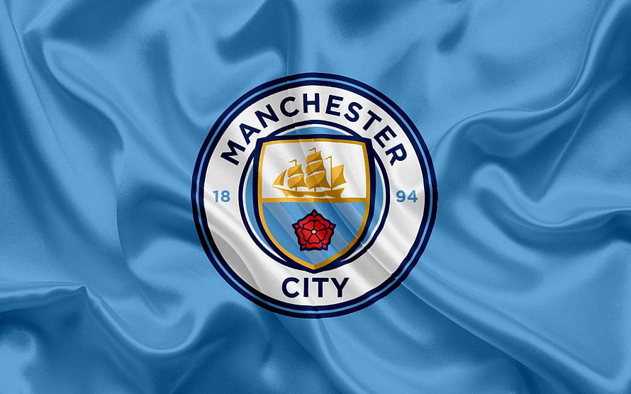 Manchester City Football Club Crest on Flowing Sky Blue Silk Fabric Background HD wallpaper