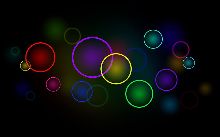 Vibrant multicolored neon circles floating on a dark abstract background HD wallpaper