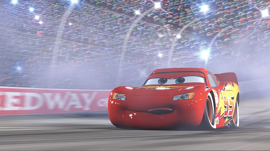 Lightning McQueen Racing on the Track in Cars Animated Movie Scene HD wallpaper