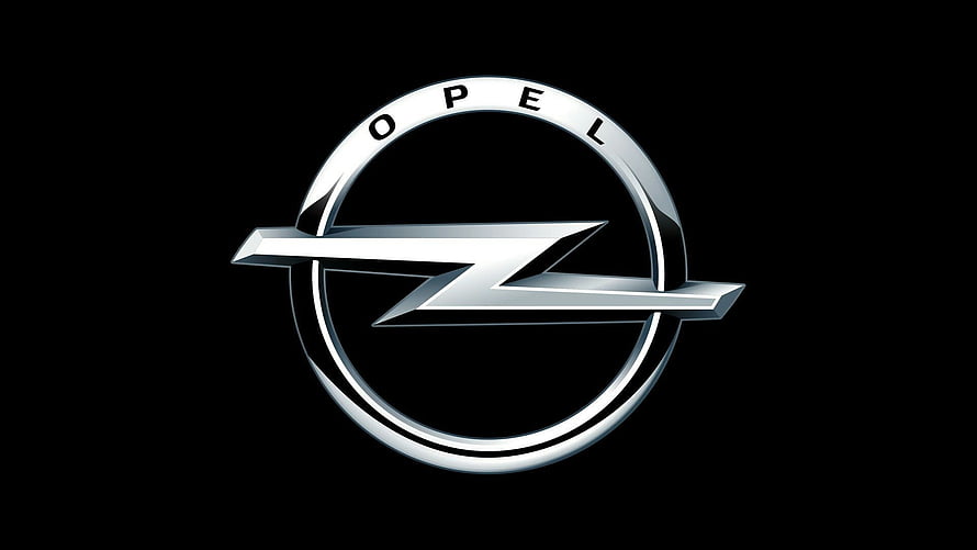 Opel Car Brand Emblem With Chrome Lightning Bolt On Black Background HD wallpaper