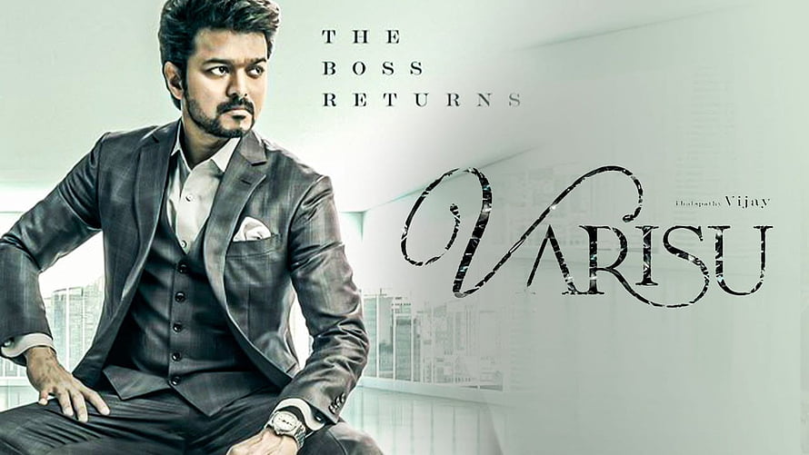 Vijay in a sharp grey suit for the movie Varisu, exuding confidence and style in a modern urban setting HD wallpaper