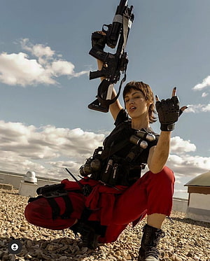 Money Heist Tokyo cosplay with tactical gear and rifle on a rooftop HD phone wallpaper