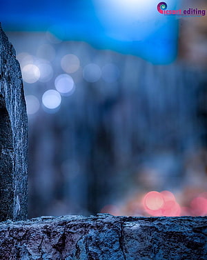 Abstract Blue Bokeh Background With Textured Stone Foreground HD phone wallpaper