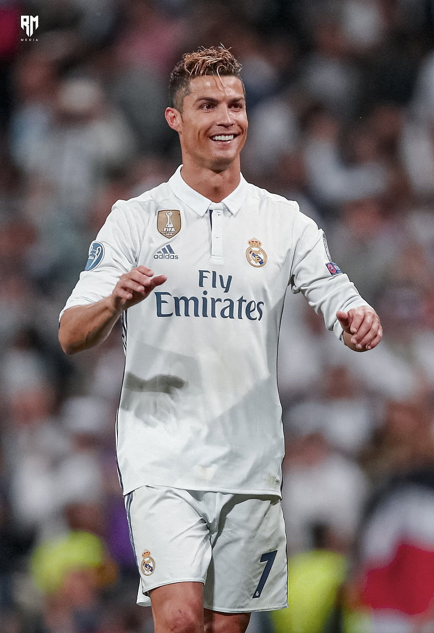 Cristiano Ronaldo in Real Madrid Home Kit Smiling on the Pitch HD phone wallpaper