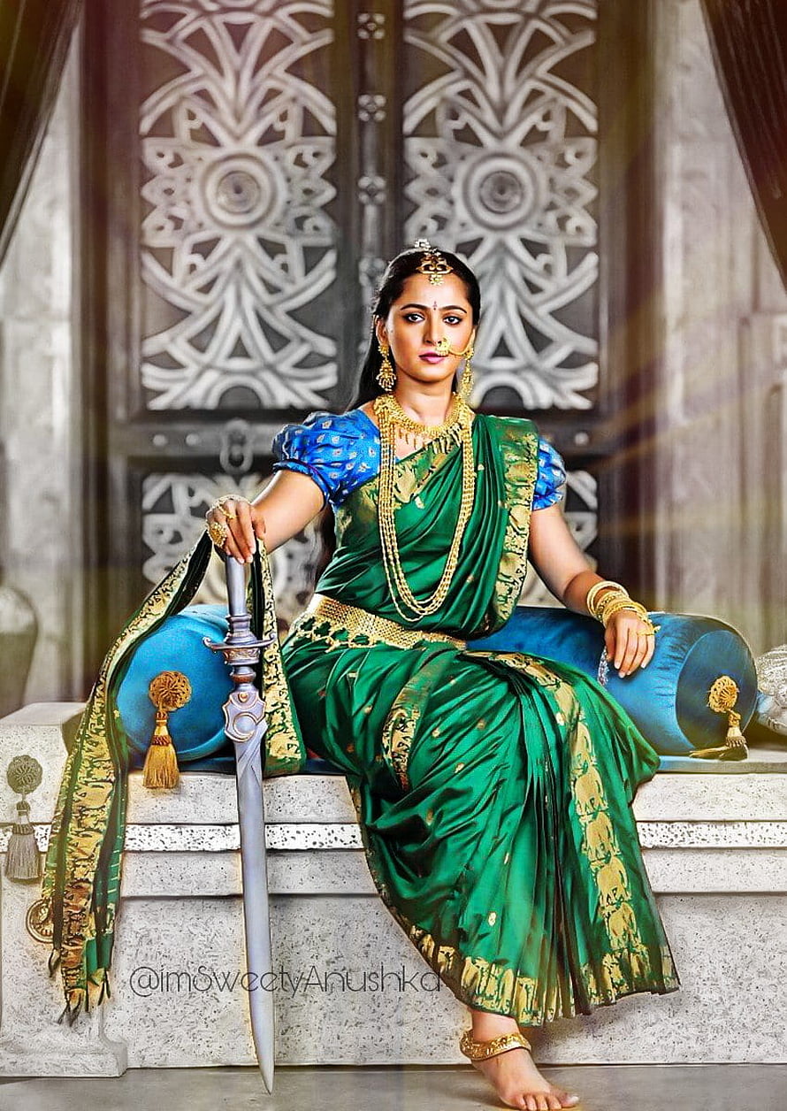 Anushka Shetty as Rani Rudrama in Green Saree Holding Sword HD phone wallpaper