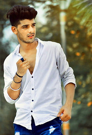 Young man in open white shirt and distressed denim jeans posing outdoors, Stylish Boy Whatsapp Dp Pic HD phone wallpaper